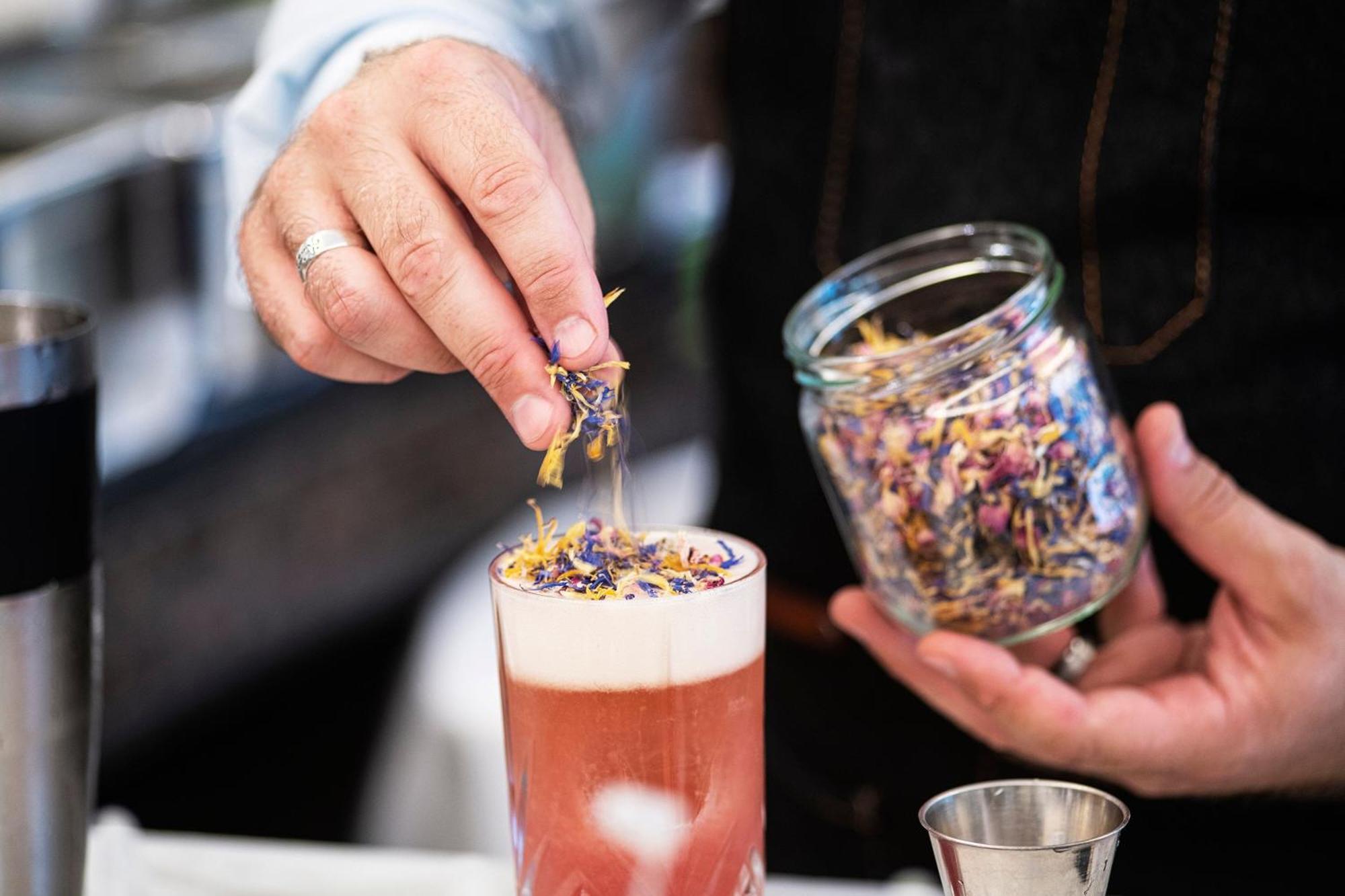 The Westin Grand Frankfurt Hotel Frankfurt am Main Exterior photo A bartender adding a garnish to a cocktail